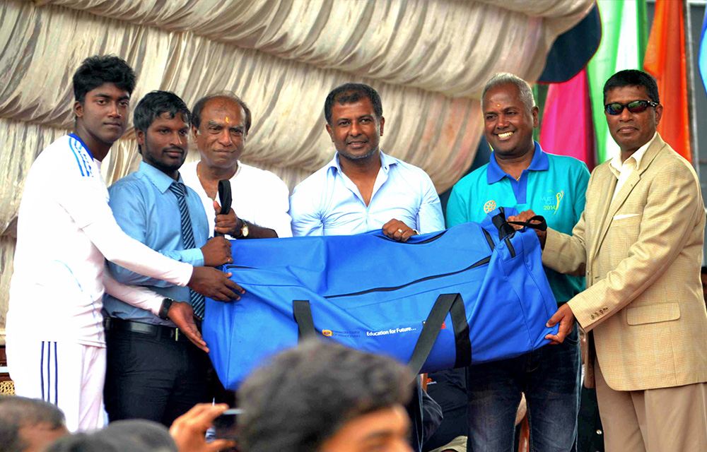 Major General Udaya Perera, Commander, Security Force Jaffna and Mr. Victor Rajeevan, CEO of NCHS presenting the cricket gear at the Murali Harmony Cup Finals.